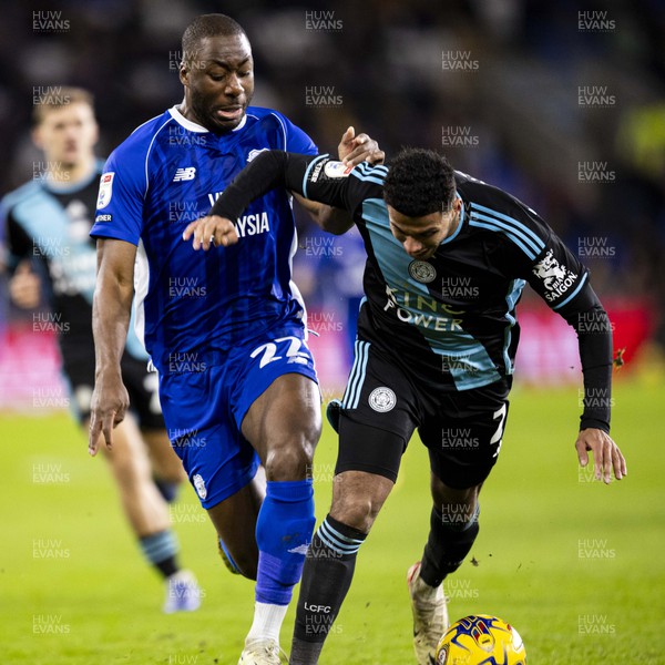 291223 - Cardiff City v Leicester City - Sky Bet Championship - Yakou Meite of Cardiff City in action against James Justin of Leicester City