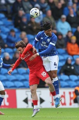 041025 - Cardiff City v Leyton Orient, EFL Sky Bet League 1 - Aaron Connolly of Leyton Orient and Gabiel Osho of Cardiff City compete for the ball