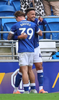 041025 - Cardiff City v Leyton Orient, EFL Sky Bet League 1 - Callum Robinson of Cardiff City is congratulated after scoring the opening goal
