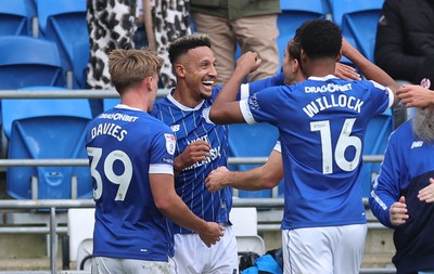 041025 - Cardiff City v Leyton Orient, EFL Sky Bet League 1 - Callum Robinson of Cardiff City is congratulated after scoring the opening goal