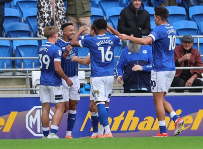 041025 - Cardiff City v Leyton Orient, EFL Sky Bet League 1 - Callum Robinson of Cardiff City is congratulated after scoring the opening goal