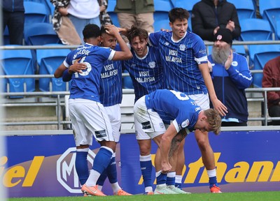 041025 - Cardiff City v Leyton Orient, EFL Sky Bet League 1 - Callum Robinson of Cardiff City is congratulated after scoring the opening goal