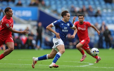 041025 - Cardiff City v Leyton Orient, EFL Sky Bet League 1 - Joel Colwill of Cardiff City wins the ball