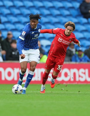 041025 - Cardiff City v Leyton Orient, EFL Sky Bet League 1 - Gabiel Osho of Cardiff City and Dominic Ballard of Leyton Orient compete for the ball