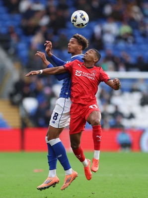 041025 - Cardiff City v Leyton Orient, EFL Sky Bet League 1 - Omari Kellyman of Cardiff City and Demi Mitchell of Leyton Orient compete for the ball