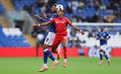 041025 - Cardiff City v Leyton Orient, EFL Sky Bet League 1 - Omari Kellyman of Cardiff City and Demi Mitchell of Leyton Orient compete for the ball