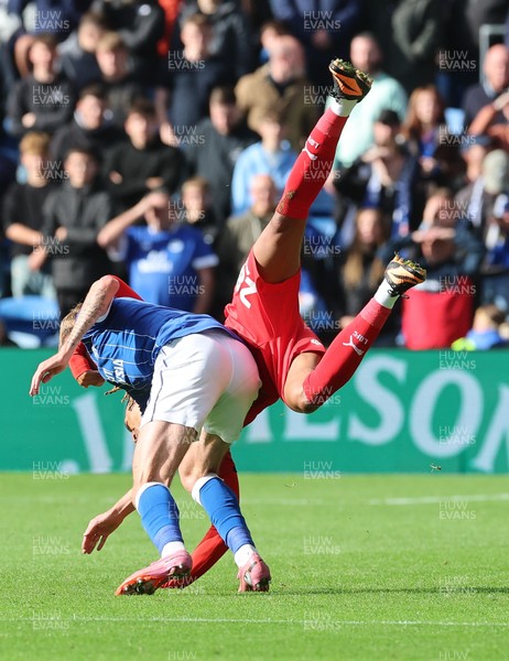 041025 - Cardiff City v Leyton Orient, EFL Sky Bet League 1 - Joel Bagan of Cardiff City and Sean Clare of Leyton Orient compete for the ball