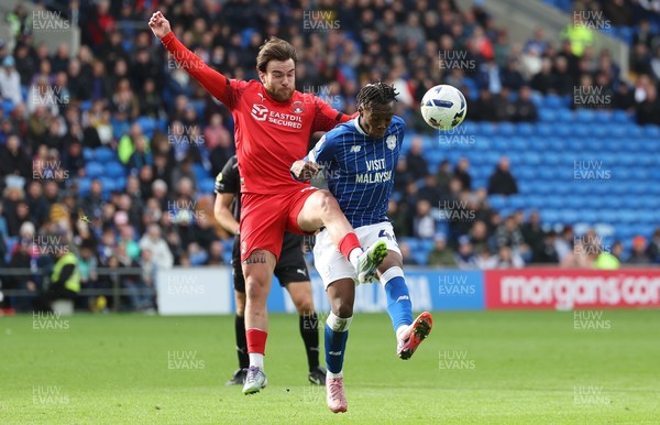 041025 - Cardiff City v Leyton Orient, EFL Sky Bet League 1 - Gabiel Osho of Cardiff City and Aaron Connolly of Leyton Orient compete for the ball
