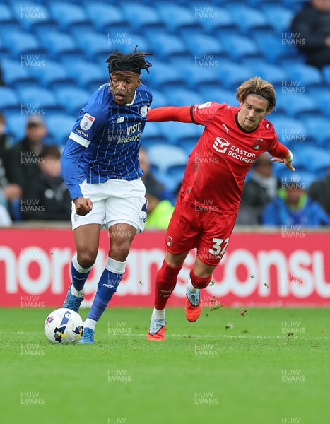 041025 - Cardiff City v Leyton Orient, EFL Sky Bet League 1 - Gabiel Osho of Cardiff City and Dominic Ballard of Leyton Orient compete for the ball