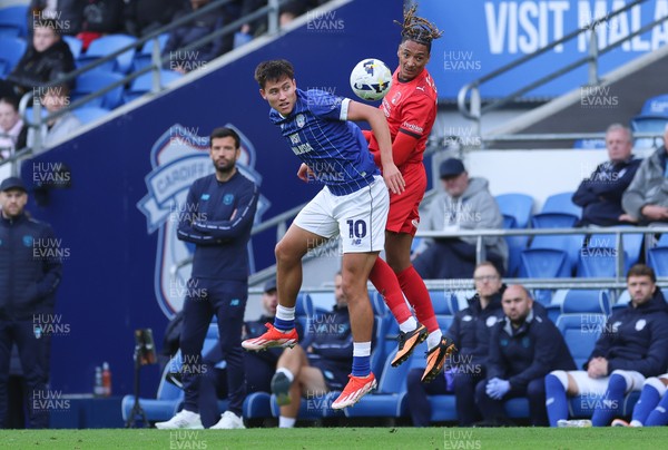 041025 - Cardiff City v Leyton Orient, EFL Sky Bet League 1 - Rubin Colwill of Cardiff City and Sean Clare of Leyton Orient compete for the ball