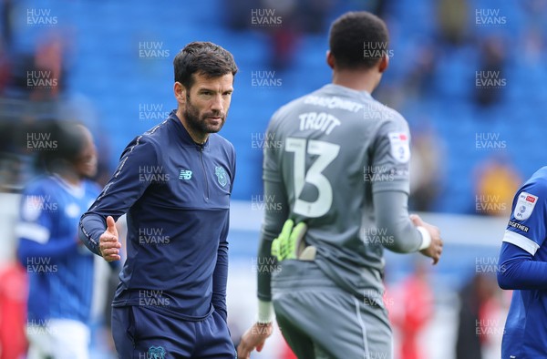 041025 - Cardiff City v Leyton Orient, EFL Sky Bet League 1 - Cardiff City head coach Brian Barry-Murphy with Cardiff City goalkeeper Nathan Trott at the end of the match