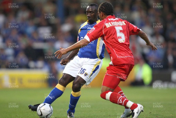 28.08.07 -Cardiff City v Leyton Orient, Carling Cup Cardiff's Jimmy Floyd Hasselbaink takes on Orients' Tamika Mkandawire 