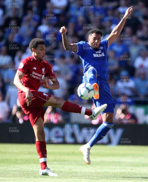 210419 - Cardiff City v Liverpool FC - Premier League - Nathaniel Mendez-Laing of Cardiff City is challenged by Trent Alexander-Arnold of Liverpool