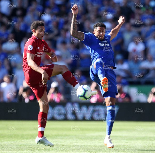 210419 - Cardiff City v Liverpool FC - Premier League - Nathaniel Mendez-Laing of Cardiff City is challenged by Trent Alexander-Arnold of Liverpool