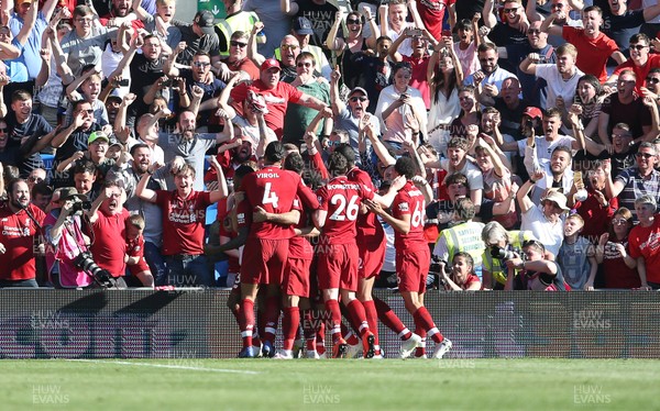 210419 - Cardiff City v Liverpool FC - Premier League - Georginio Wijnaldum of Liverpool celebrates scoring a goal with team mates