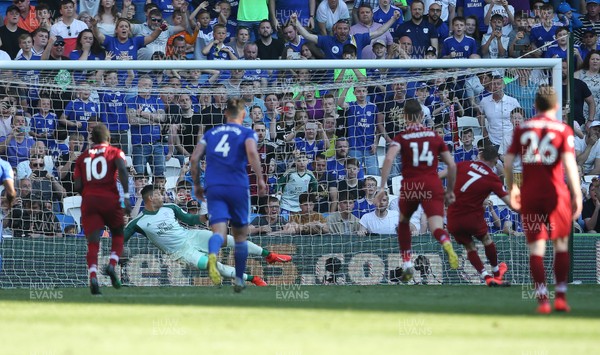 210419 - Cardiff City v Liverpool FC - Premier League - James Milner of Liverpool scores a goal from the penalty spot