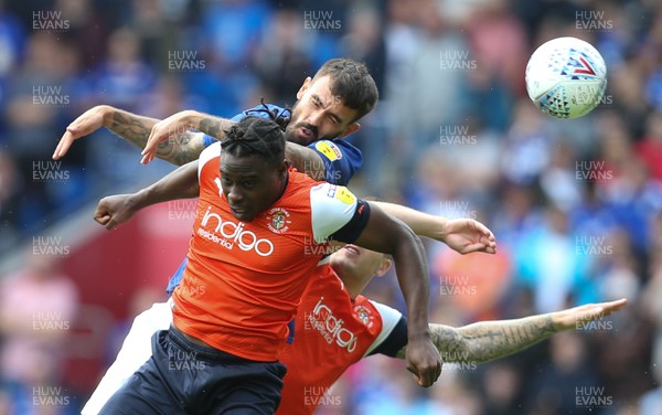 100819 - Cardiff City v Luton Town, Sky Bet Championship - Pelly-Rudock Mpanza of Luton Town holds off Marlon Pack of Cardiff City   as they compete for the ball