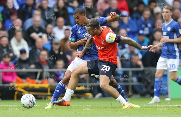 100819 - Cardiff City v Luton Town, Sky Bet Championship - Lee Peltier of Cardiff City and George Moncur of Luton Town compete for the ball