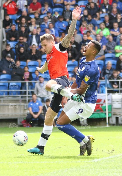 100819 - Cardiff City v Luton Town, Sky Bet Championship - James Collins of Luton Town and Robert Glatzel of Cardiff City compete for the ball