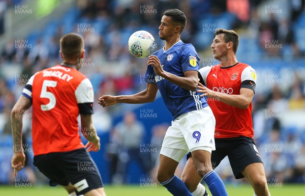 100819 - Cardiff City v Luton Town, Sky Bet Championship - Robert Glatzel of Cardiff City controls the ball under pressure from Matty Pearson of Luton Town and Sonny Bradley of Luton Town