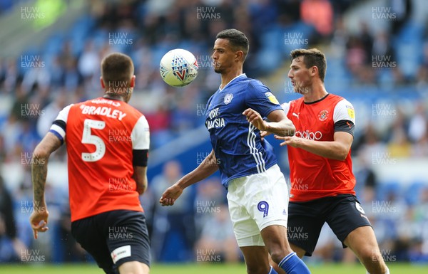 100819 - Cardiff City v Luton Town, Sky Bet Championship - Robert Glatzel of Cardiff City controls the ball under pressure from Matty Pearson of Luton Town and Sonny Bradley of Luton Town