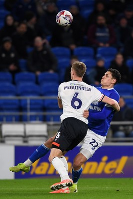 110325 - Cardiff City v Luton Town - Sky Bet Championship - Yousef Salech of Cardiff City is challenged by Mark McGuinness of Luton Town