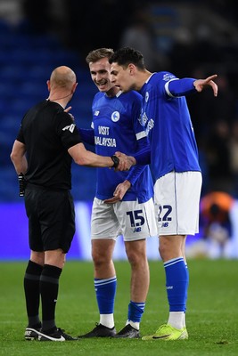 110325 - Cardiff City v Luton Town - Sky Bet Championship - Yousef Salech and Sivert Mannsverk of Cardiff City consult with the officials at full time