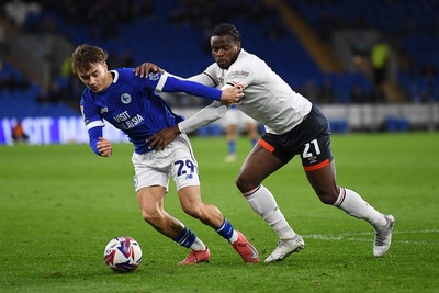 110325 - Cardiff City v Luton Town - Sky Bet Championship - Will Alves of Cardiff City is challenged by Millenic Alli of Luton Town