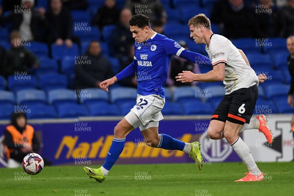 110325 - Cardiff City v Luton Town - Sky Bet Championship - Yousef Salech of Cardiff City is challenged by Mark McGuinness of Luton Town