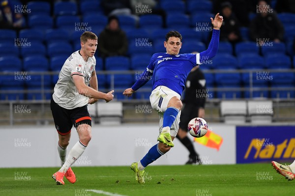 110325 - Cardiff City v Luton Town - Sky Bet Championship - Yousef Salech of Cardiff City is challenged by Mark McGuinness of Luton Town