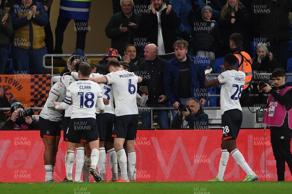 110325 - Cardiff City v Luton Town - Sky Bet Championship - Jordan Clark of Luton Town celebrates scoring a goal with team mates