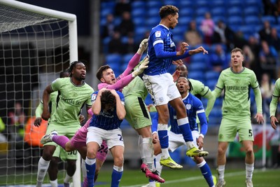 140226 - Cardiff City v Luton Town - Sky Bet League 1 - Josh Keeley of Luton reaches for the ball