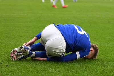 140226 - Cardiff City v Luton Town - Sky Bet League 1 - Joel Bagan of Cardiff City is tackled by Nigel Lonwijk of Luton