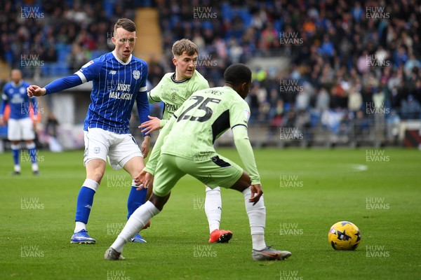140226 - Cardiff City v Luton Town - Sky Bet League 1 - David Turnbull of Cardiff City is challenged by Isaiah Jones of Luton