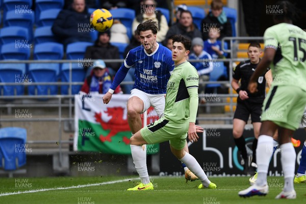 140226 - Cardiff City v Luton Town - Sky Bet League 1 - Ollie Tanner of Cardiff City is challenged by Joe Johnson of Luton