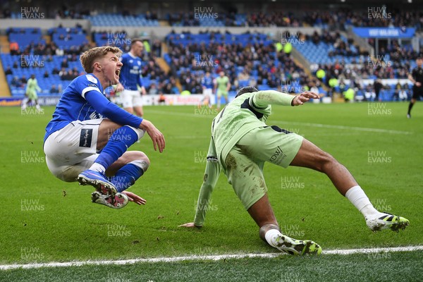 140226 - Cardiff City v Luton Town - Sky Bet League 1 - Joel Bagan of Cardiff City is tackled by Nigel Lonwijk of Luton