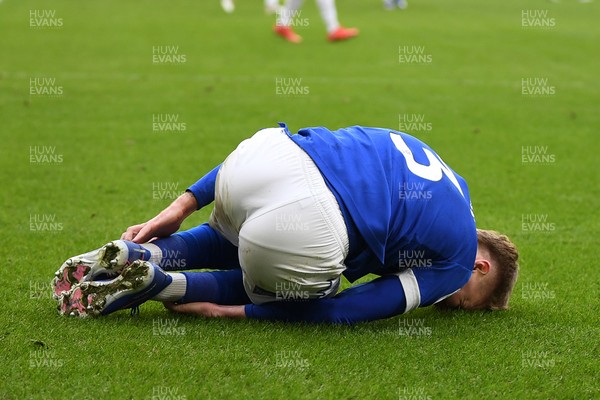 140226 - Cardiff City v Luton Town - Sky Bet League 1 - Joel Bagan of Cardiff City is tackled by Nigel Lonwijk of Luton