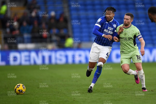 140226 - Cardiff City v Luton Town - Sky Bet League 1 - Gabriel Osho of Cardiff City is challenged by Jordan Clark of Luton