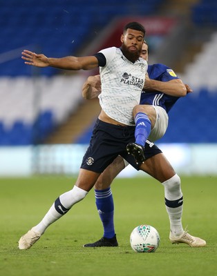 270819 - Cardiff City v Luton Town, EFL  Cup, Round 2 - Jake Jervis of Luton Town and Ciaron Brown of Cardiff City compete for the ball