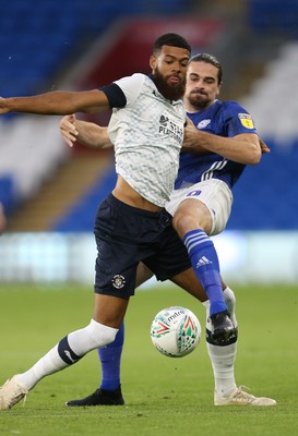 270819 - Cardiff City v Luton Town, EFL  Cup, Round 2 - Jake Jervis of Luton Town and Ciaron Brown of Cardiff City compete for the ball