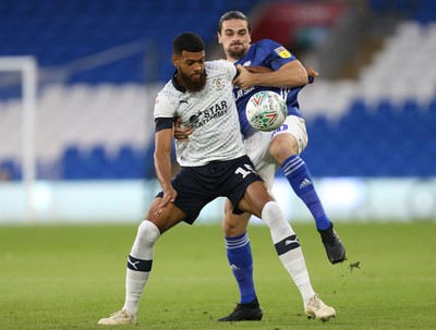 270819 - Cardiff City v Luton Town, EFL  Cup, Round 2 - Jake Jervis of Luton Town and Ciaron Brown of Cardiff City compete for the ball