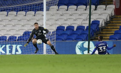 270819 - Cardiff City v Luton Town, EFL  Cup, Round 2 - Cardiff City goalkeeper Joe Day is beaten as Junior Hoilett of Cardiff City, right, puts the ball into his own net to score own goal