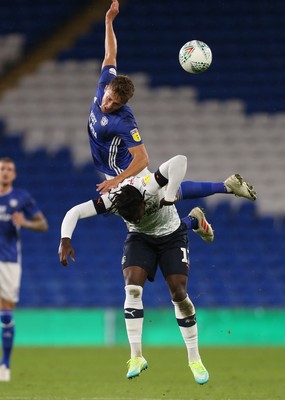 270819 - Cardiff City v Luton Town, EFL  Cup, Round 2 - Will Vaulks of Cardiff City gets above Pelly-Ruddock Mpanza of Luton Town to head the ball