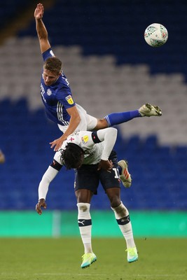 270819 - Cardiff City v Luton Town, EFL  Cup, Round 2 - Will Vaulks of Cardiff City gets above Pelly-Ruddock Mpanza of Luton Town to head the ball