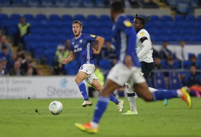 270819 - Cardiff City v Luton Town, EFL  Cup, Round 2 - Will Vaulks of Cardiff City plays the ball across to Isaac Vassell of Cardiff City