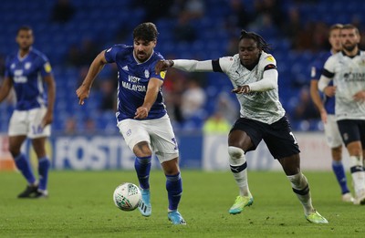 270819 - Cardiff City v Luton Town, EFL  Cup, Round 2 - Callum Paterson of Cardiff City breaks away past Pelly-Ruddock Mpanza of Luton Town