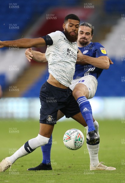 270819 - Cardiff City v Luton Town, EFL  Cup, Round 2 - Jake Jervis of Luton Town and Ciaron Brown of Cardiff City compete for the ball