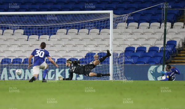 270819 - Cardiff City v Luton Town, EFL  Cup, Round 2 - Cardiff City goalkeeper Joe Day is beaten as Junior Hoilett of Cardiff City, right, puts the ball into his own net to score own goal