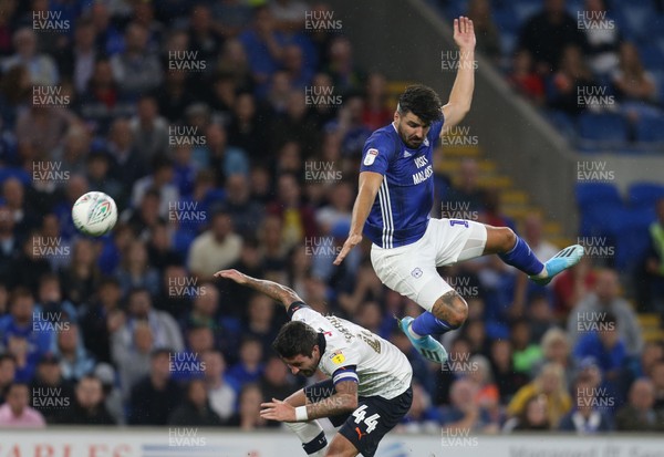 270819 - Cardiff City v Luton Town, EFL  Cup, Round 2 - Callum Paterson of Cardiff City and Alan Sheehan of Luton Town compete for the ball