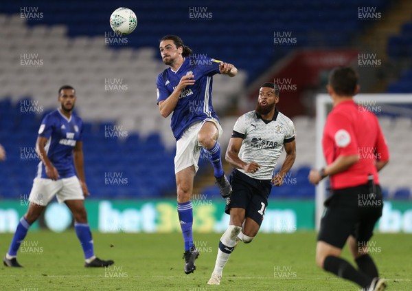 270819 - Cardiff City v Luton Town, EFL  Cup, Round 2 - Ciaron Brown of Cardiff City heads the ball clear